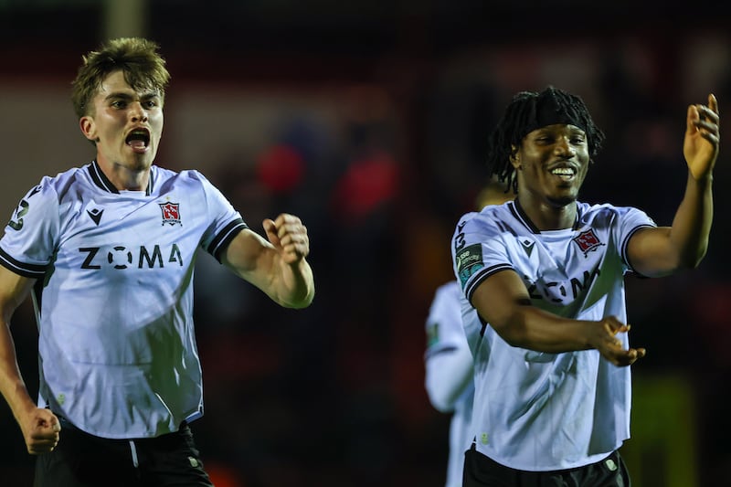 Dundalk's Eoin Kenny and Gbemi Arubi celebrate after their win against Shelbourne. Photograph: Inpho/Dan Clohessy