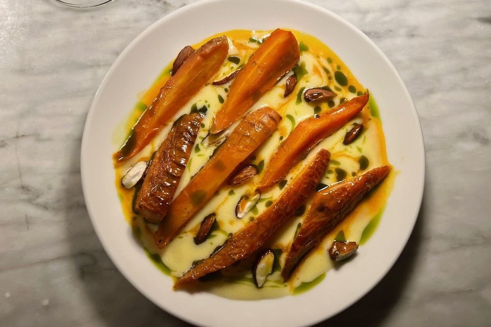 Smoked honey glazed carrots, buttermilk sauce, almond and thyme. Photo: Lucinda O’Sullivan
