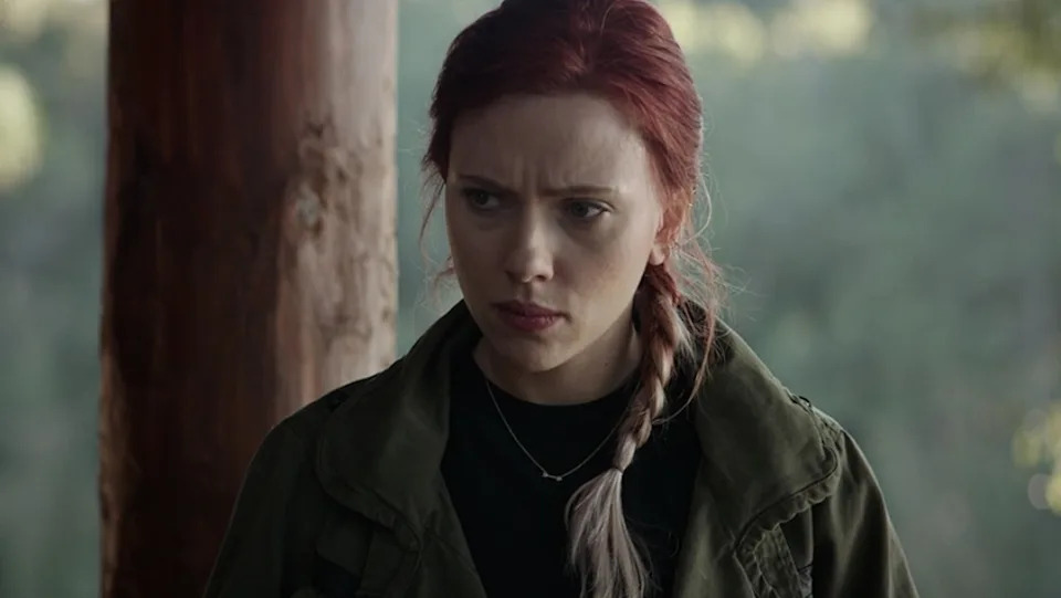Natasha Romanoff (aka Black Widow) looks sad and wears her hair in a two-tone braid in a scene from Avengers: Endgame.
