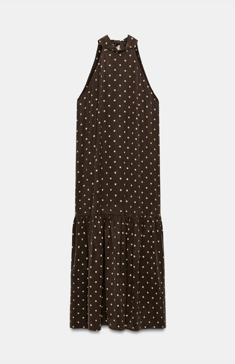 sleeveless brown dress with polka dots and a flared skirt