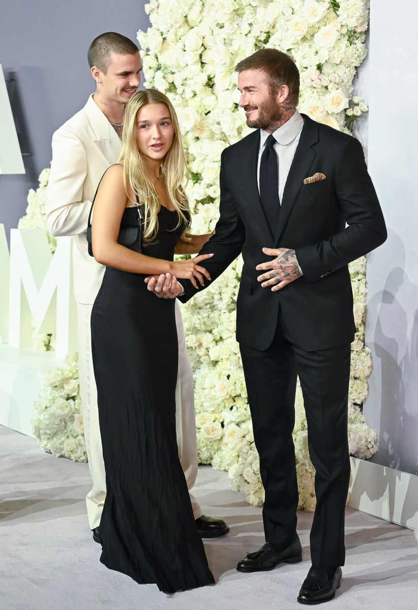 Harper Beckham steps out in satin and feathers at Holly Ramsay’s winter wedding