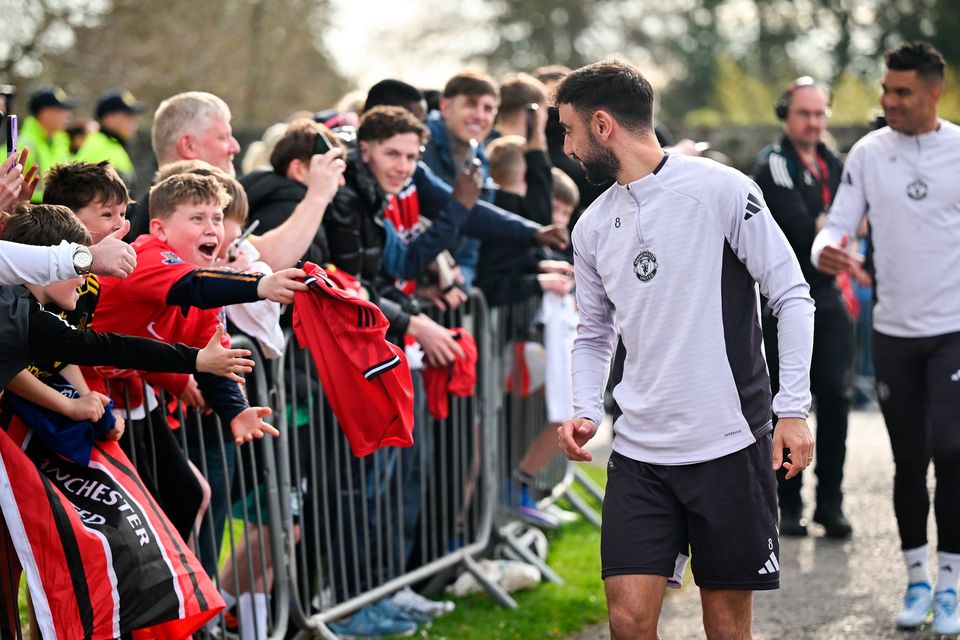 7 April 2026; Bruno Fernandes with supporters before a Manchester United squad training session at Carton House in Kildare. Photo by David Fitzgerald/Sportsfile