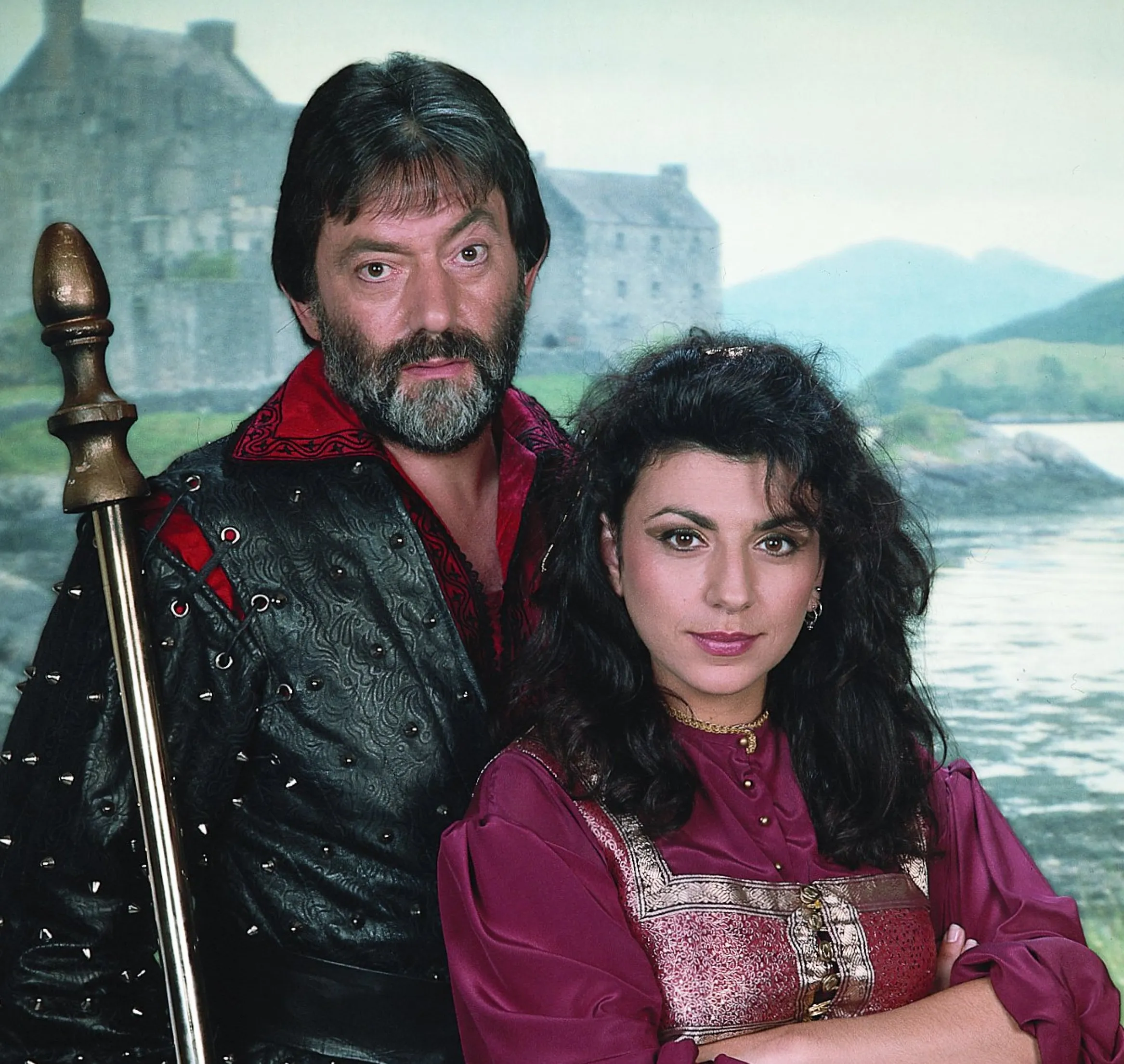 Actors Hugo Myatt and Jackie Sawiris posing for the children's game show "Knightmare."