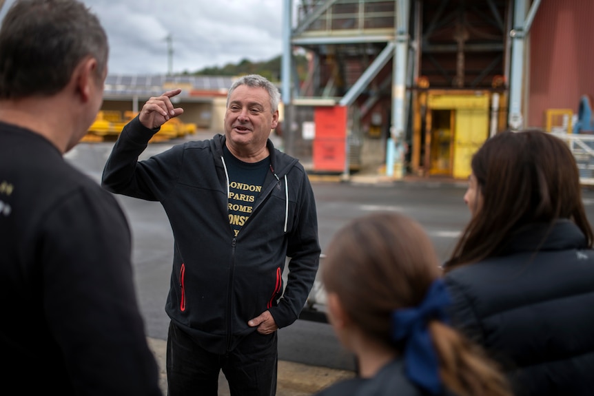 Brant Webb talks to visitors at the mine museum.