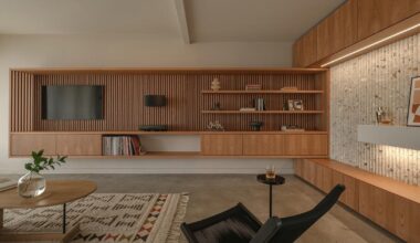 interlocking millwork volumes reshape brooklyn apartment