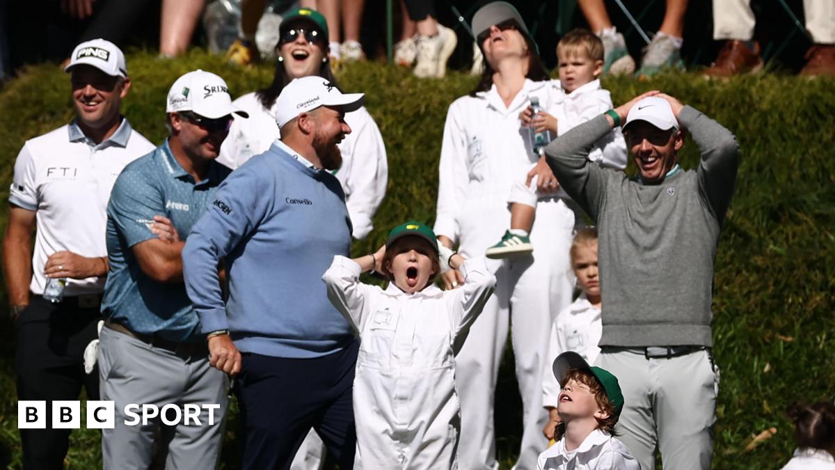 Shane Lowry, Rory McIlroy and their families react to Frankie Fleetwood hitting his ball in the water on the ninth hole of Augusta National's par three course