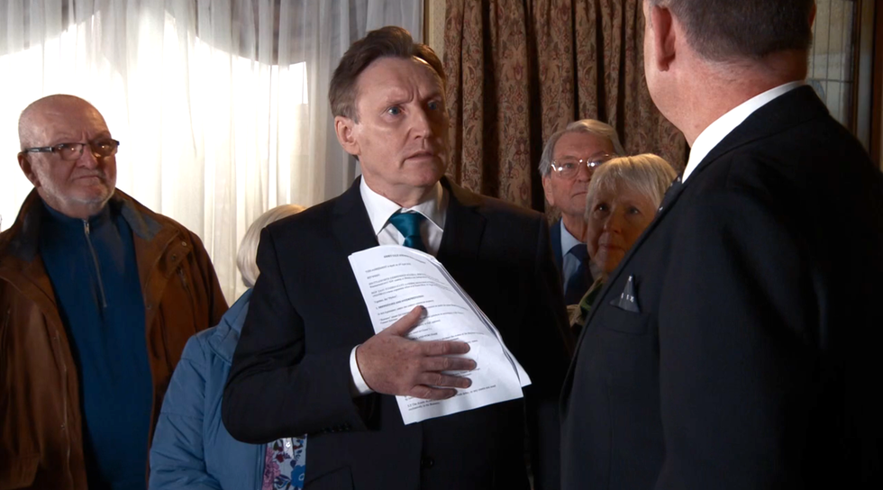 coronation street, george confronts rupert in the undertakers.