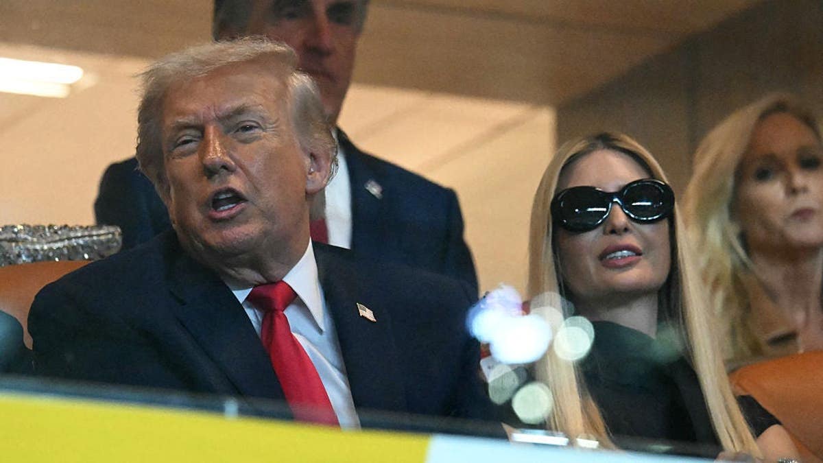 US President Donald Trump and daughter Ivanka Trump seated at Hard Rock Stadium