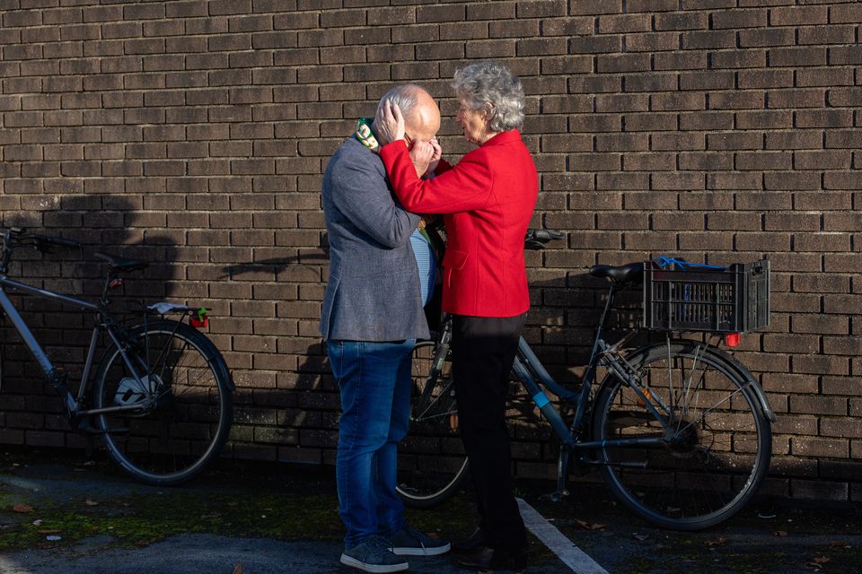 President Catherine Connolly embraces her campaign manager Danny Callanan, after she was deemed elected before leaving the Galway West count centre. Photo: Mark Condren
