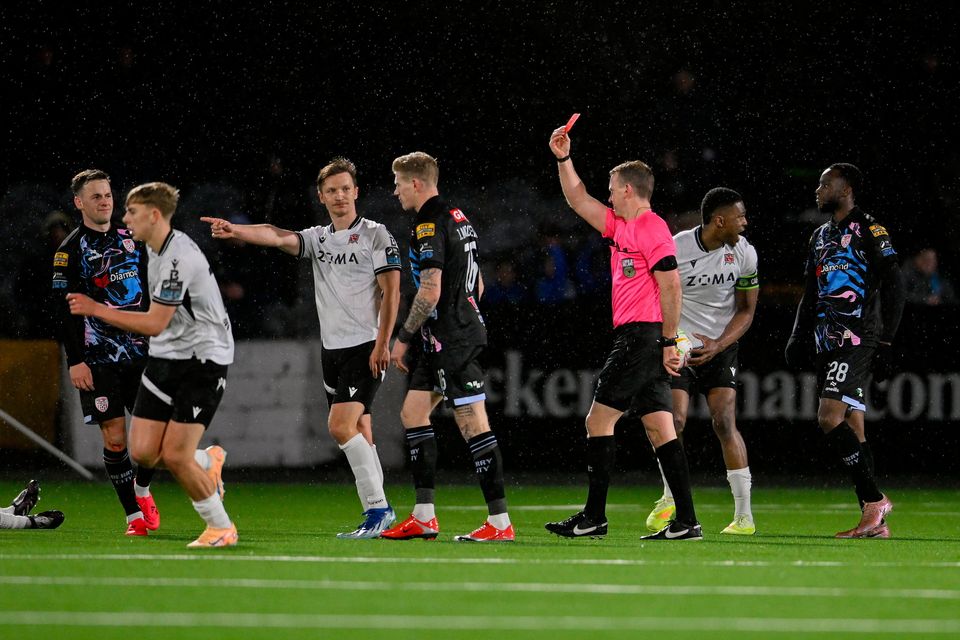 Referee Paul Norton gives James McClean of Derry City a red card (after a second yellow) at Oriel Park. Photo: Paul Phelan/Sportsfile