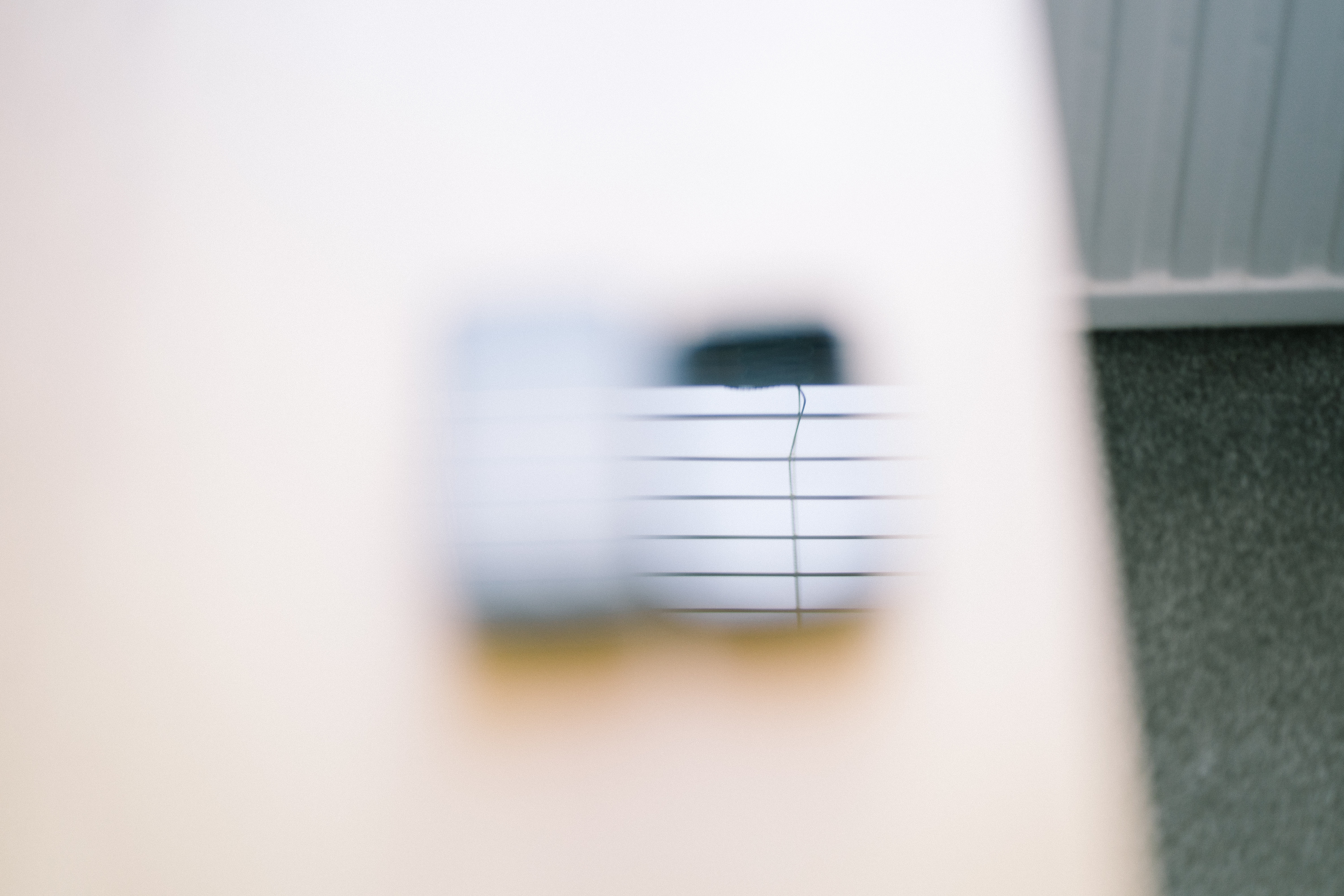 Two bike computers side by side, one with a matte screen, one with a shiny one