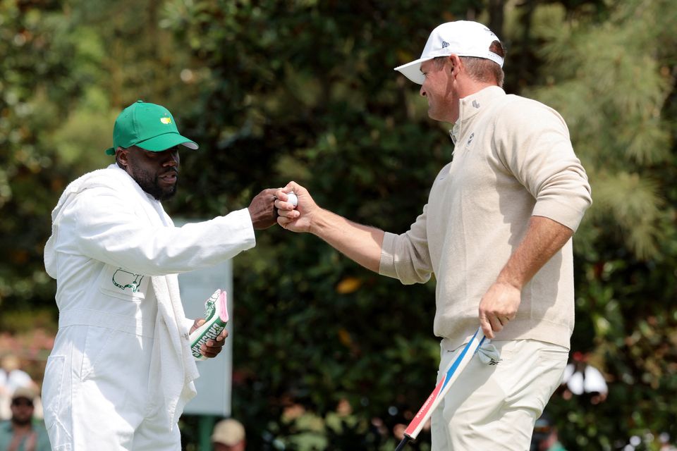 Golf - The Masters - Augusta National Golf Club, Augusta, Georgia, U.S. - April 8, 2026
Bryson DeChambeau of the U.S. with his caddie, comedian and actor Kevin Hart during the par 3 contest REUTERS/Kylie Cooper
