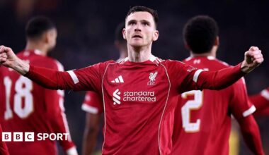 Andy Robertson lifts the Premier League trophy in 2025