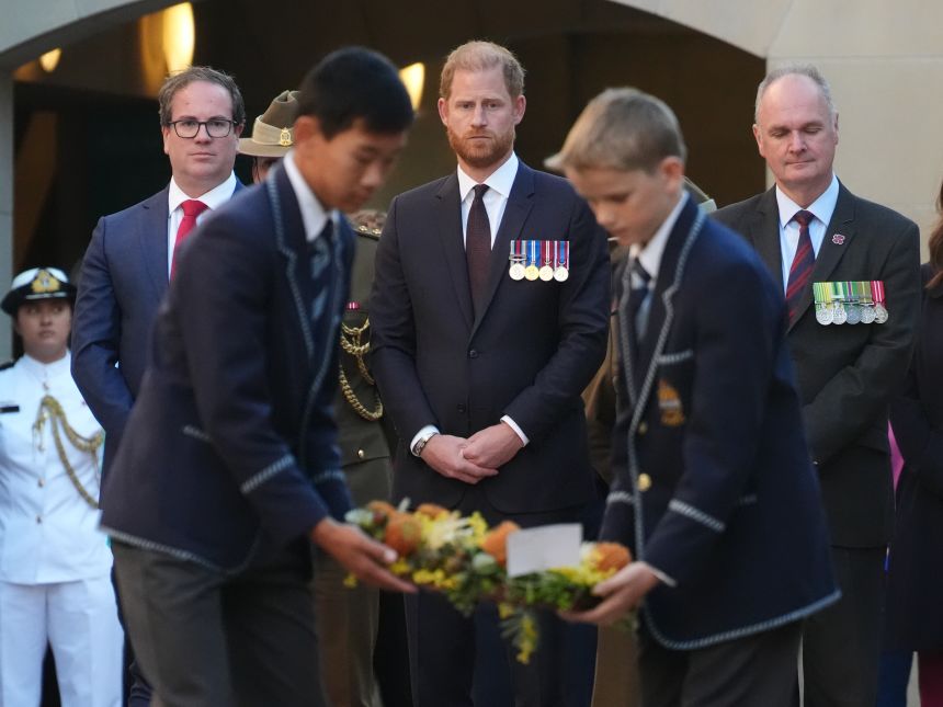 Prince Harry, Duke of Sussex observes wreath laying during the Last Post Ceremony the Australian War Memorial on April 15, 2026 in Canberra, Australia.