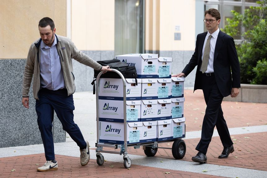 Boxes from MoloLamken, a firm representing Elon Musk arrives to court at the Ronald V. Dellums Federal Building on April 28, 2026 in Oakland, California.