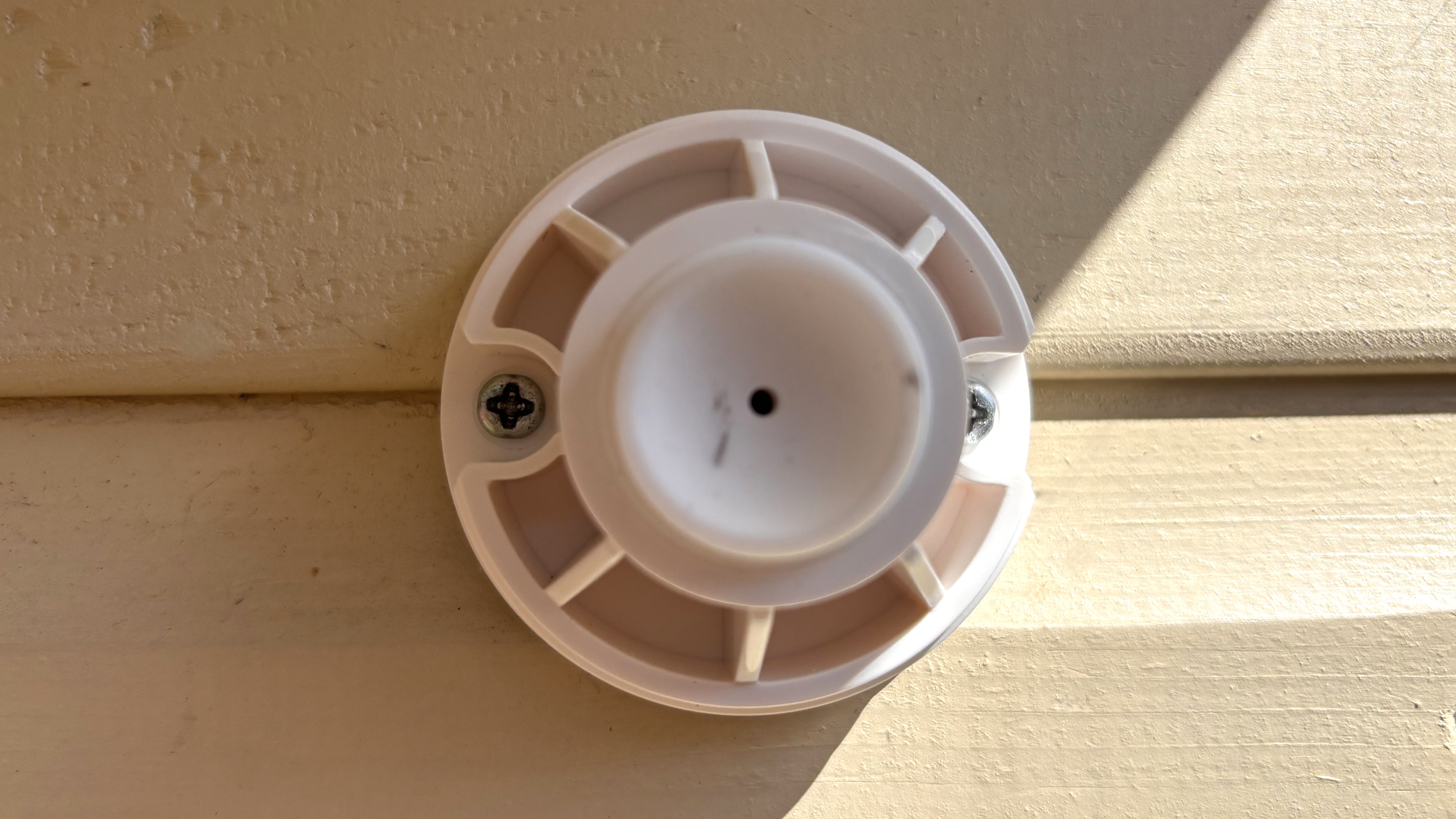 Reolink Solar Floodlight Cam mount attached to wall