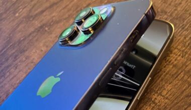 An image with two iPhones made to look like they're folding