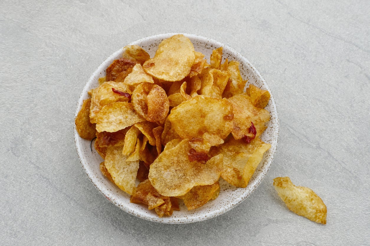 Packet in: Even transferring crisps from a bag to a bowl can help shift the experience of eating