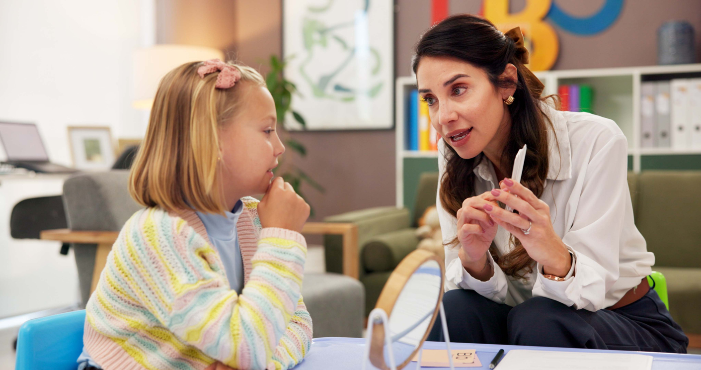 Mirror, speech therapy and cards with woman and girl for language assessment, sound and teaching. Tongue placement, child development and phonics exam with person and kid for education consulting