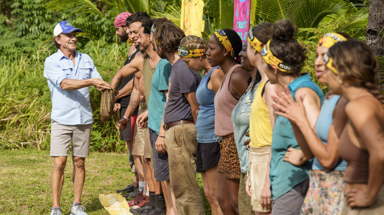 Jeff Probst and the contestants of Survivor 50