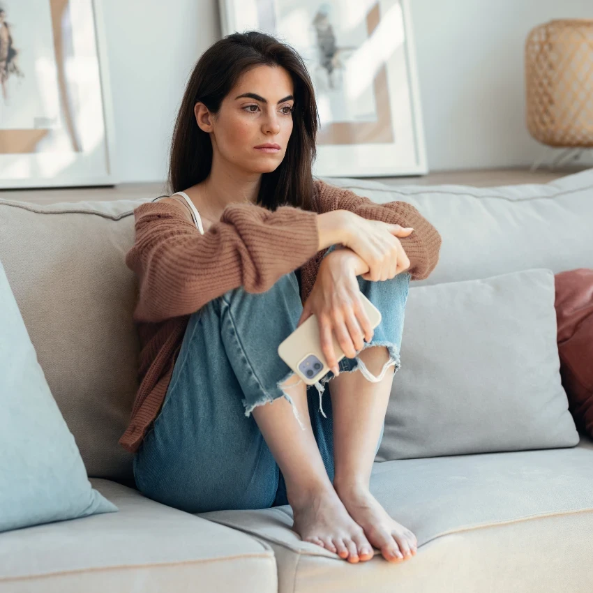 woman worried about how much money she has saved for retirement