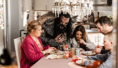 Mr Lordi at a table with a family eating food