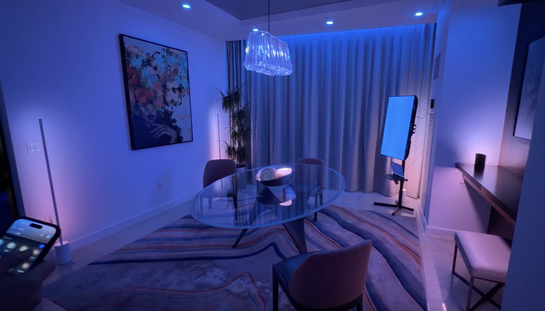 A room illuminated by various Philips Hue products using its new SpatialAware feature.