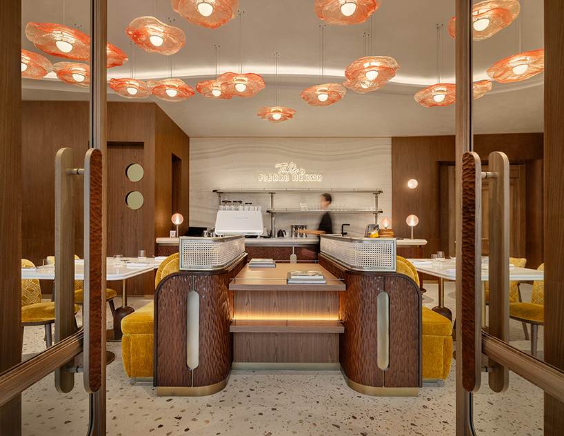 curved wood, rattan, and macaron displays frame a tropical french pâtisserie in singapore - 11