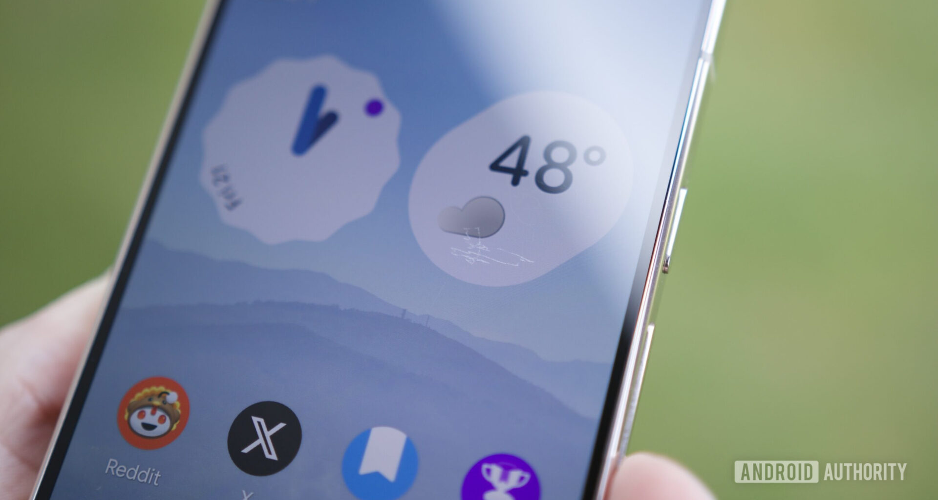 A close-up photo of a Pixel 10 Pro with scratches on its screen.