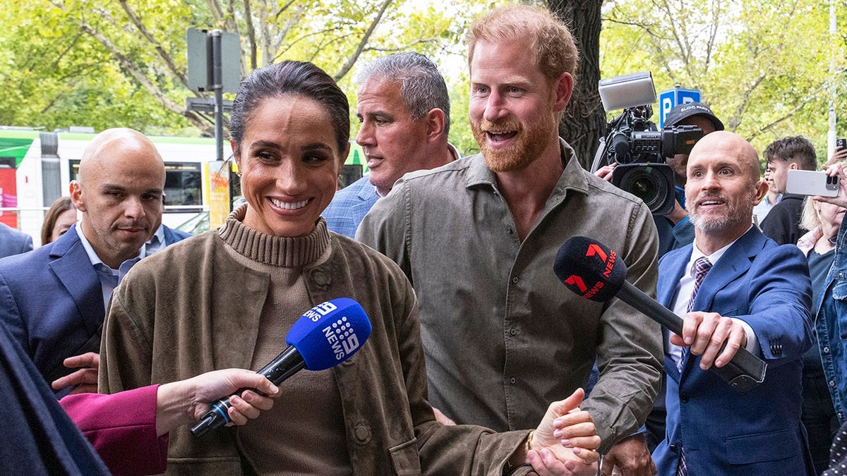 Prince Harry and Meghan Markle arriving at Australian National Veterans Arts Museum in Melbourne