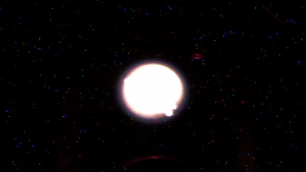 Image of a spherical flame in an experiment onboard the ISS. Credit - Science@NASA / Goddard Space Flight Center