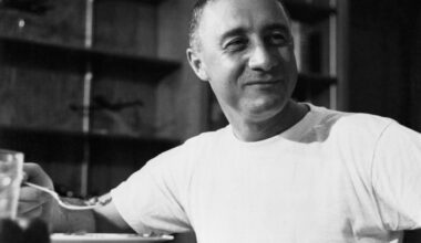 Grissom wears a t-shirt while eating a meal after his Mercury-Redstone 4 flight.