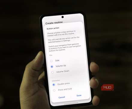 Samsung phone in hand showing button action menu