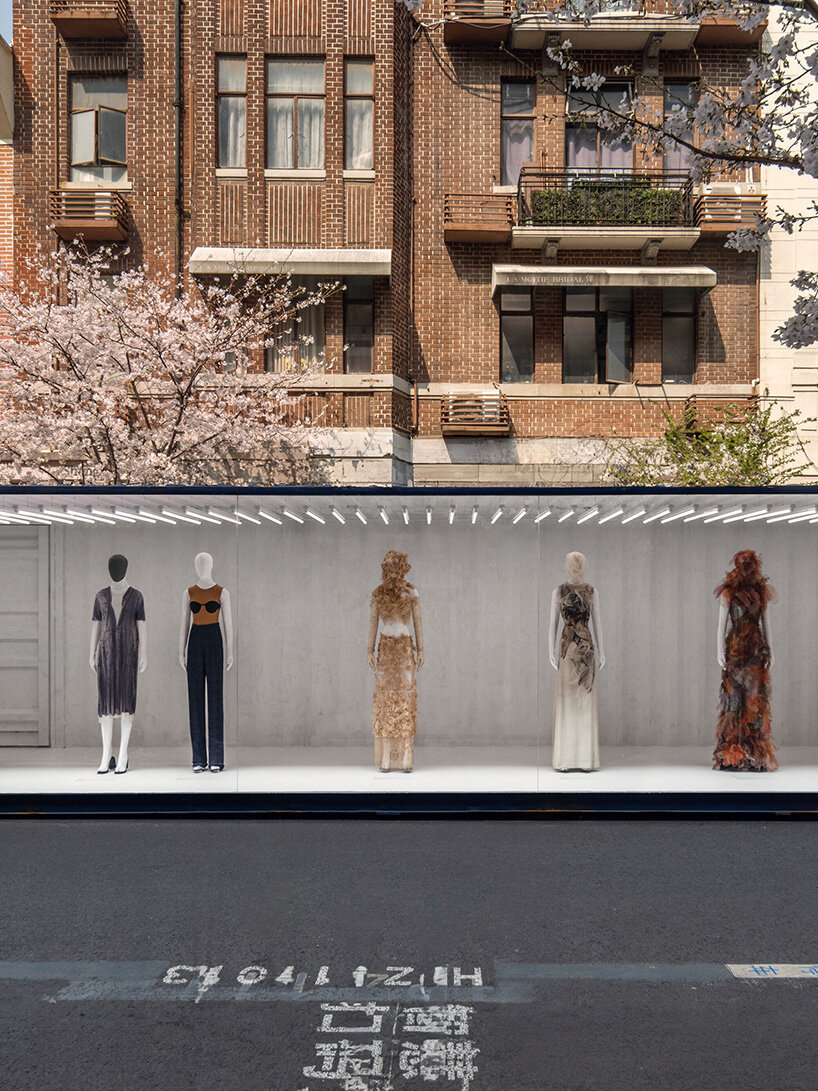 shipping containers frame maison margiela's shanghai exhibition by OMA / AMO in china - 3