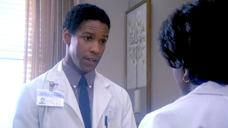 Denzel Washington as Dr. Philip Chandler talks to a fellow doctor in St. Elsewhere