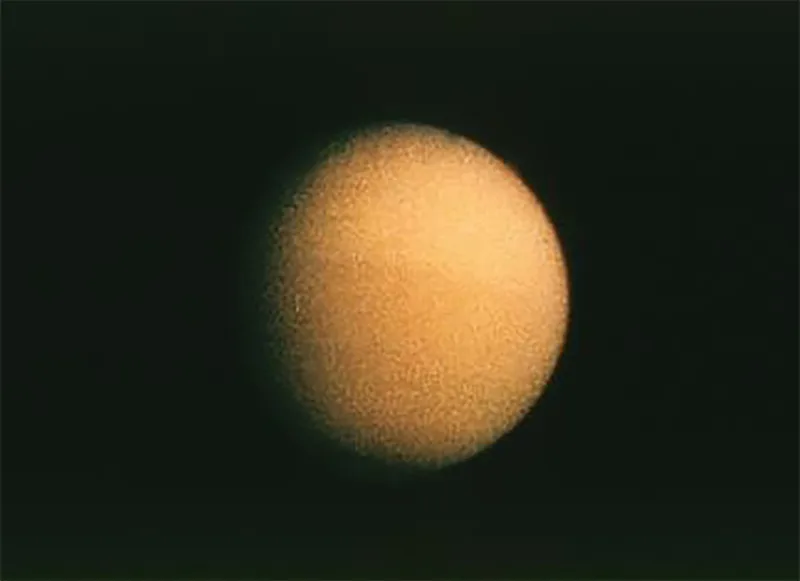 An image of Saturn's moon Titan captured by a Voyager probe. Credit: NASA