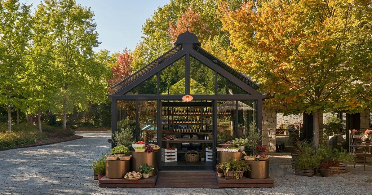 aluminum greenhouse extends restaurant and retail space in madrid