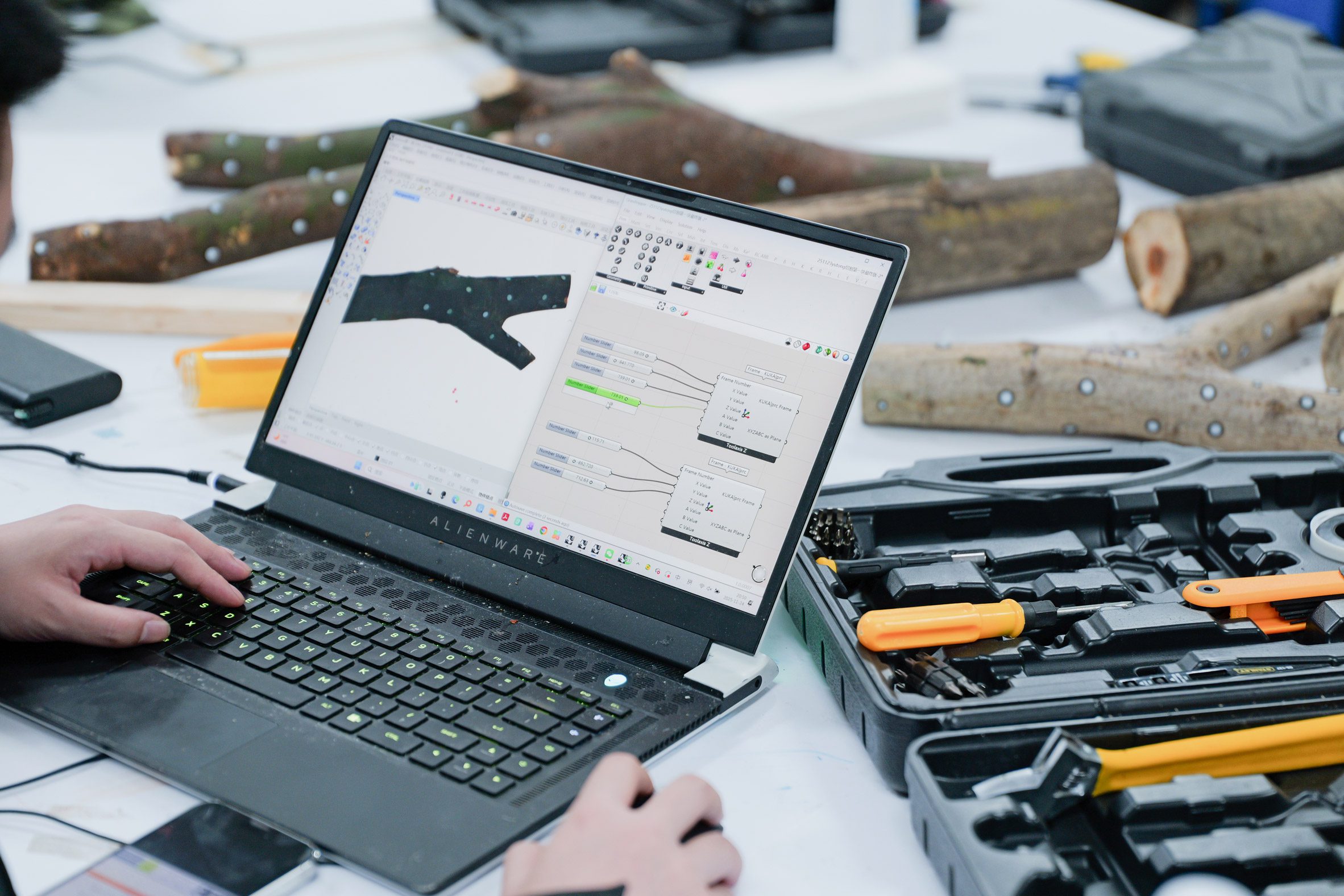 a photograph of a person using a laptop 