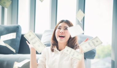 Person throwing money in the air.