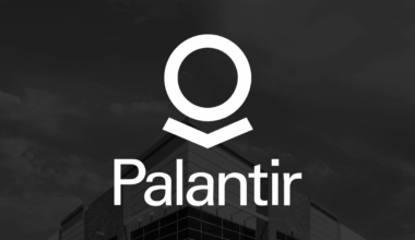 Palantir logo in front of backdrop with corporate building in background.