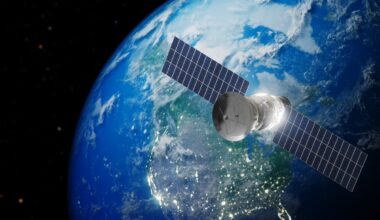 A graphic of a satellite in orbit above the United States.