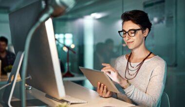 An investor works at a computer in an office.