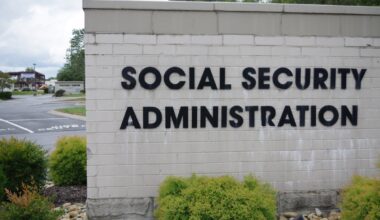 A brick sign with the words "Social Security Administration" in large black letters.