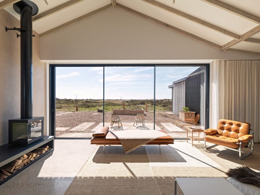 Pared-back living room with coastal views