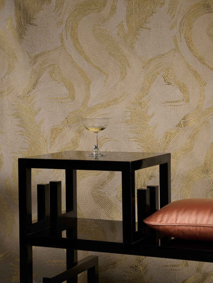 A series of images depicting brass-clad furniture, or sheeny coffee tables, in a lavish, luxury hotel-inspired setting.
