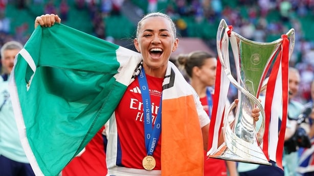 Katie McCabe of Arsenal celebrates with the UEFA Women's Champions League trophy after the Champions League final match between Arsenal and Barcelona at Estádio José Alvalade in Lisbon, Portugal.