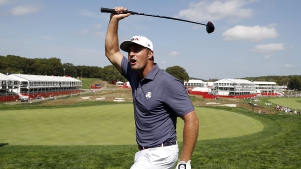 FARMINGDALE, NEW YORK - SEPTEMBER 23: Bryson DeChambeau of Team United States acknowledges the crowd while playing the 18th hole prior to the Ryder Cup 2025 at Black Course at Bethpage State Park Golf Course on September 23, 2025 in Farmingdale, New York. (Photo by Michael Reaves/PGA of America/PGA