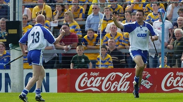 16 May 2004; Waterford's Dan Shanahan, right, celebrates the second of his three goals with teammate John Mullane, as Clare supporters look on. Guinness Munster Senior Hurling Championship, Clare v Waterford, Semple Stadium, Thurles, Co. Tipperary. Picture credit; Damien Eagers / SPORTSFILE
