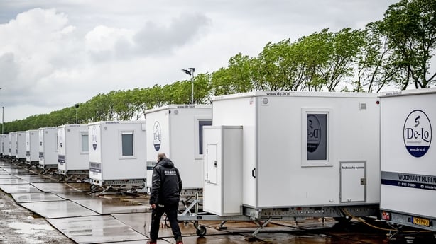 This photograph shows the the port of Rotterdam being prepared for the arrival of the Dutch Hantavirus-hit cruise ship MV Hondius where the ship's crew members will undergo a medical screening in Rotterdam on May 17, 2026. Cruise ship MV Hondius is expected to arrive at the port of Rotterdam on May