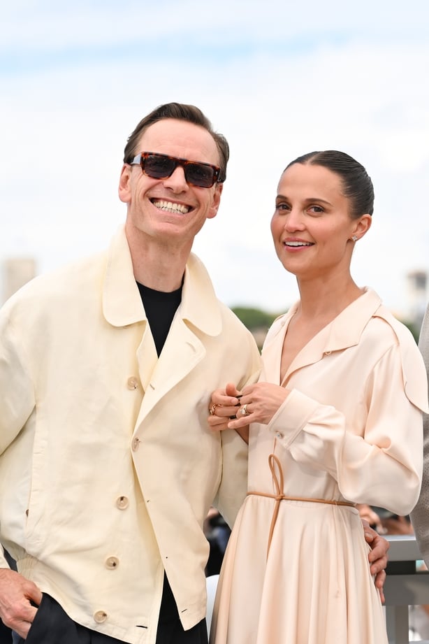 Alicia Vikander and Michael Fassbender pose during the Hope photocall at the 79th annual Cannes Film Festival
